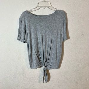 Grey shirt with knot at bottom